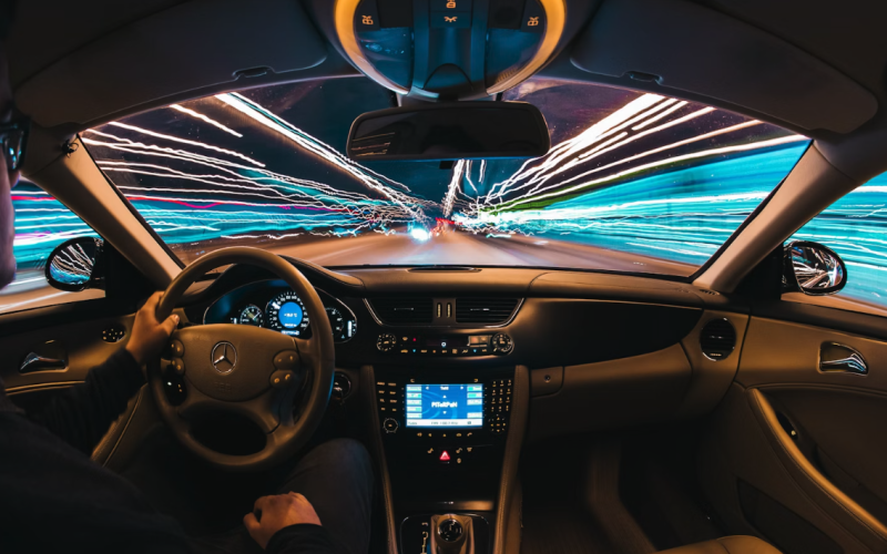 man driving car at night time