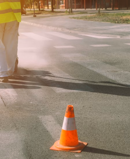 worker-is-painting-zebra-pedestrian-crosswalk-2024-12-06-23-50-03-utc